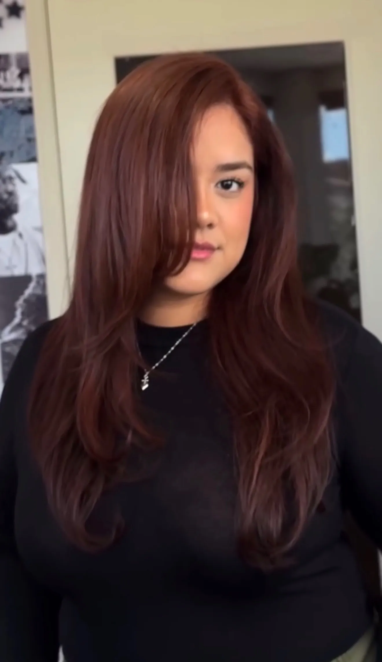 Deep auburn red hair color on long layers by Alma Juarez at The Mane Allure, Houston